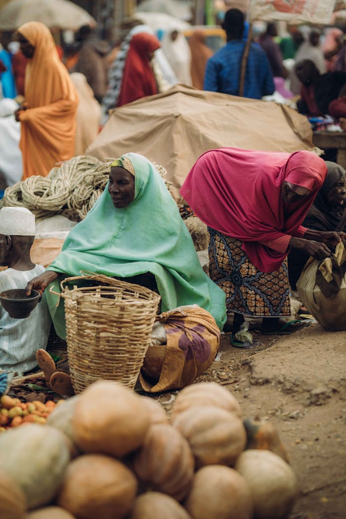 The Art of Drawing Readers In: Your attractive post title goes here Colorful street market scene with people trading fresh vegetables and goods outdoors.